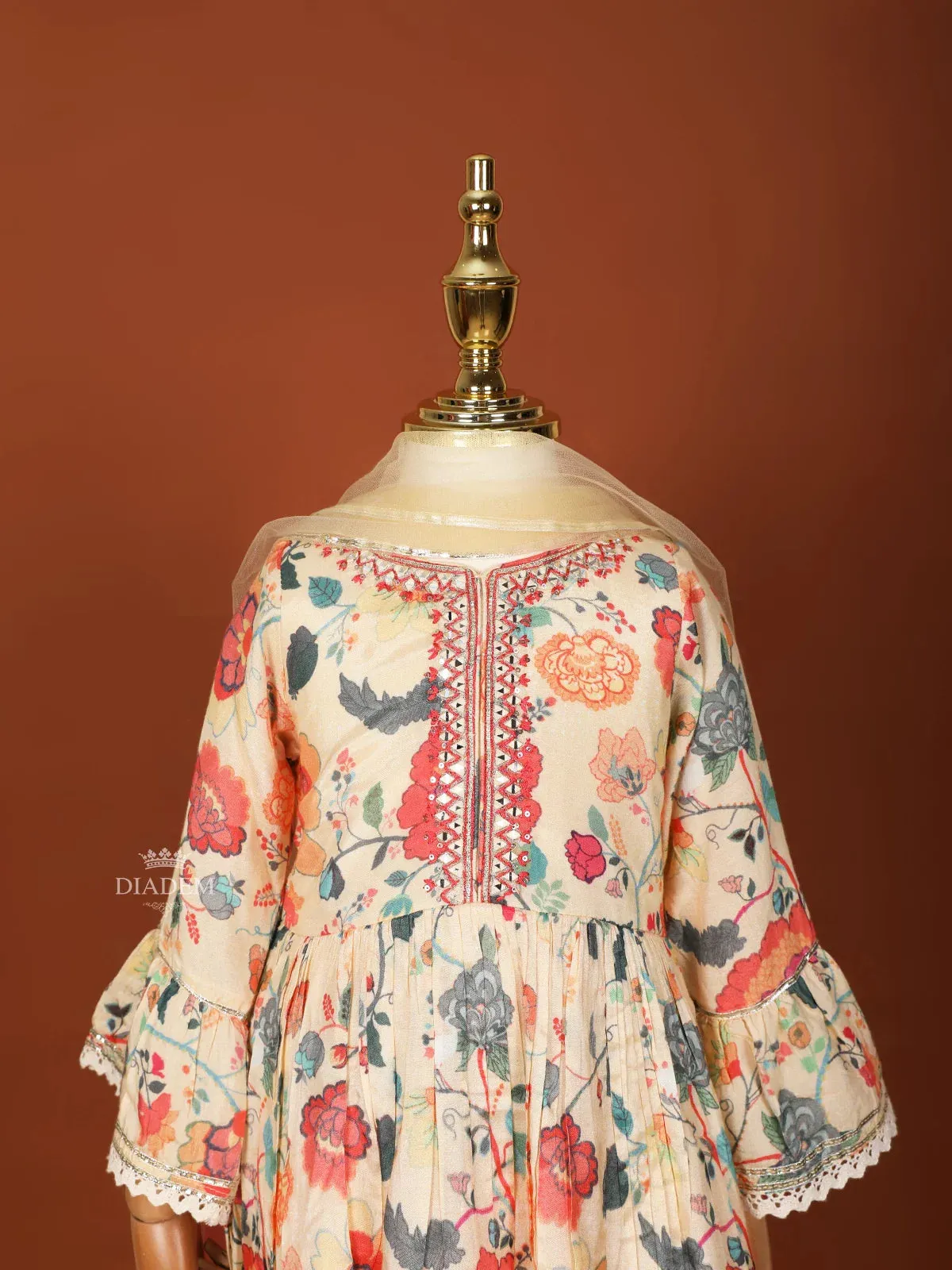 Cream Georgette Sharara Set with Floral Prints and paired with Dupatta